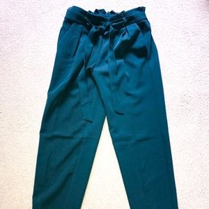 Emerald green trousers